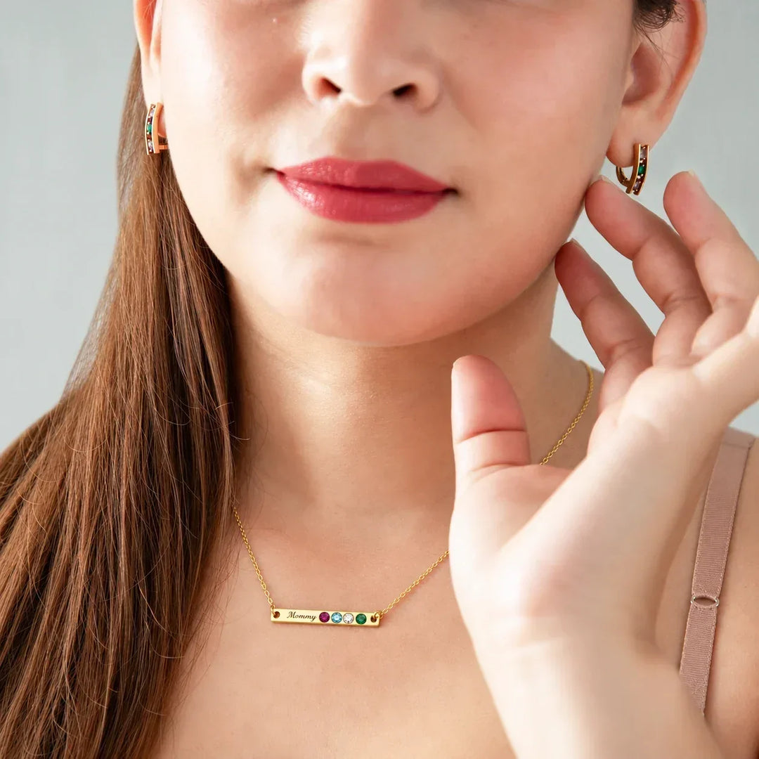 The Bar Necklace That Holds a Name and a Birthstone
