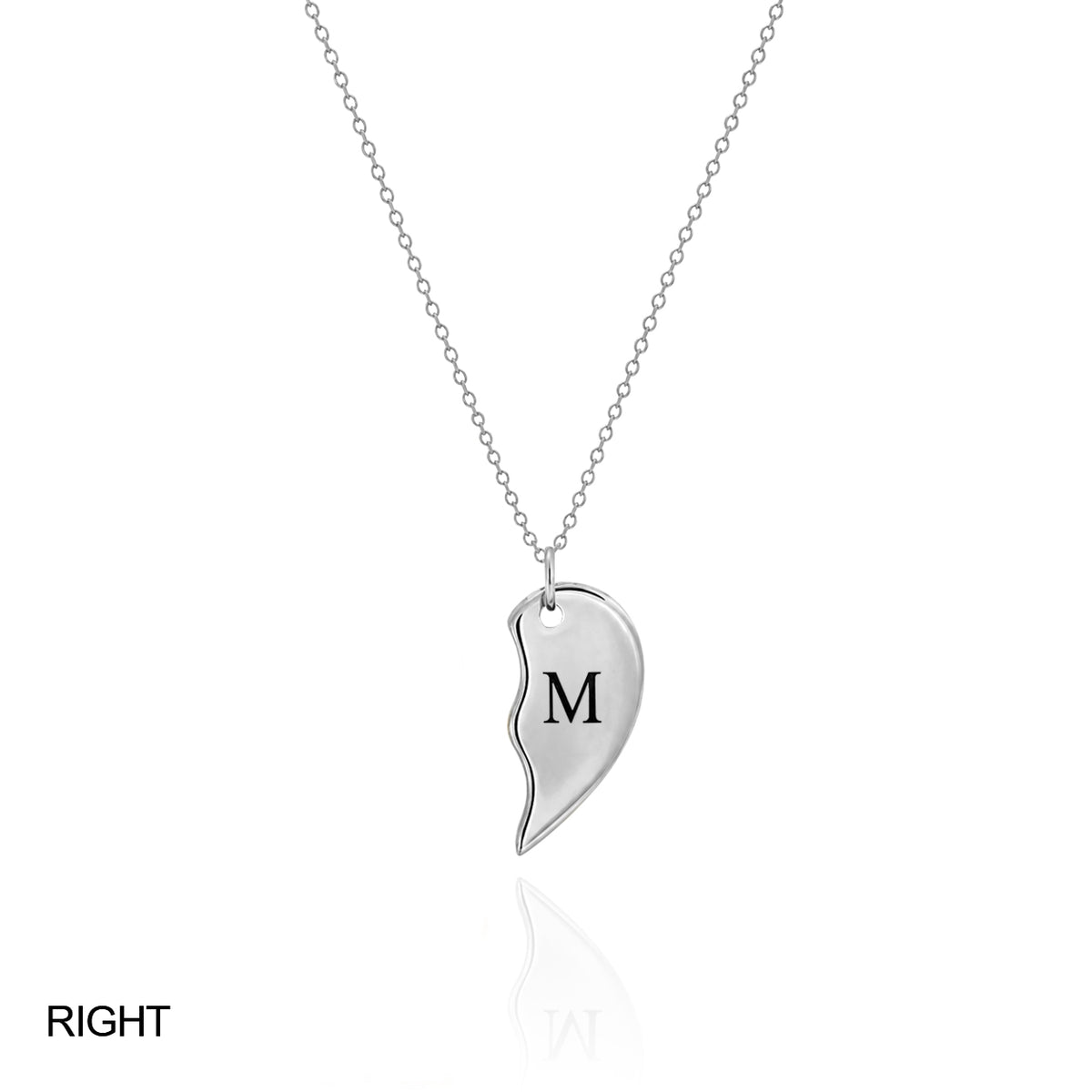 Silver-tone right half of a split heart necklace engraved M on a white background