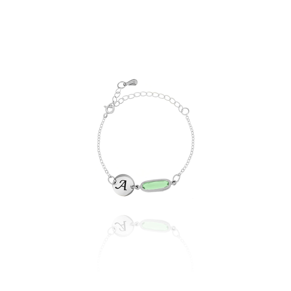 Silver-tone bracelet with engraved A initial disc and pale green elongated rectangular stone on white background