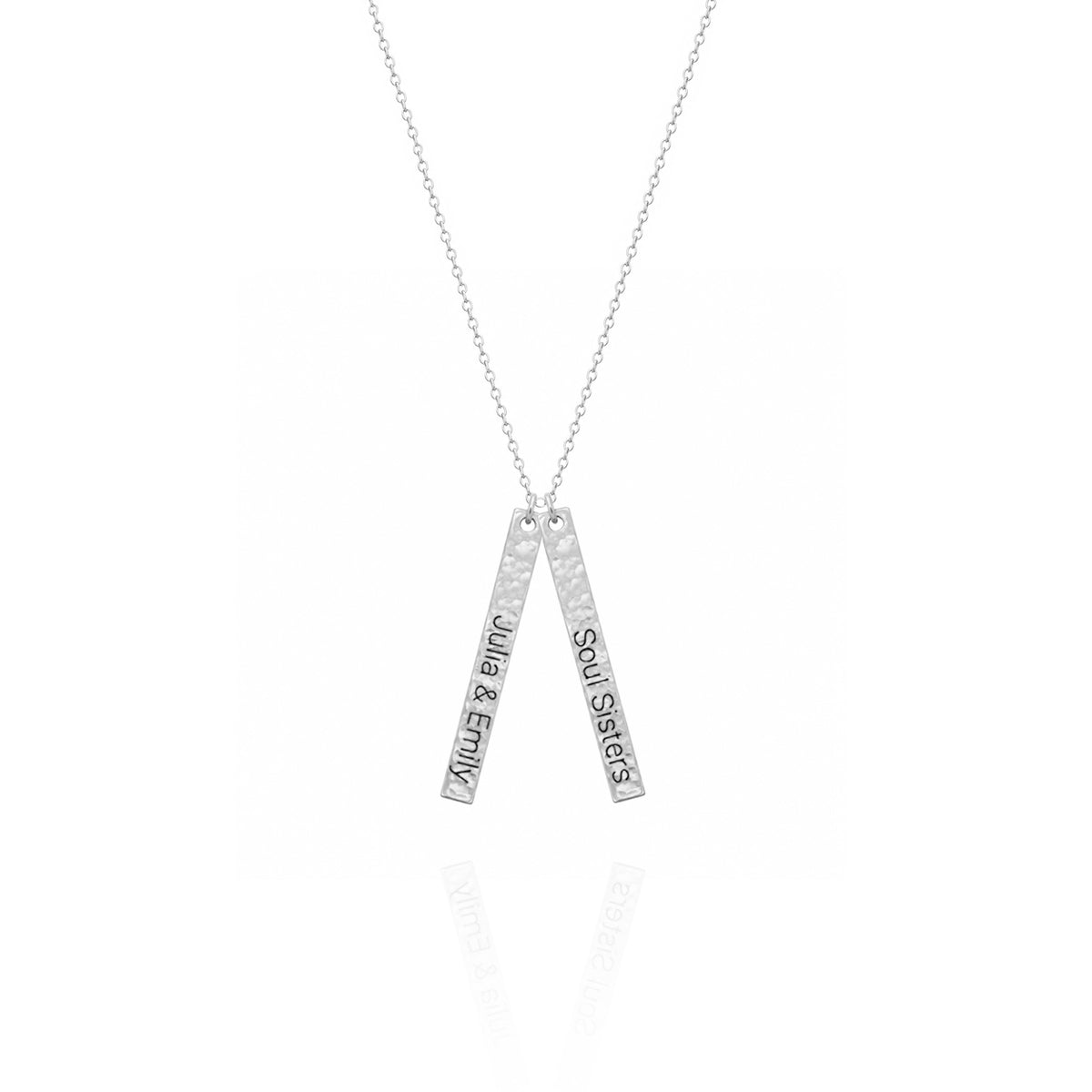 Silver-tone hammered bar necklace with two pendants engraved Julia & Emily and Soul Sisters! on a white background