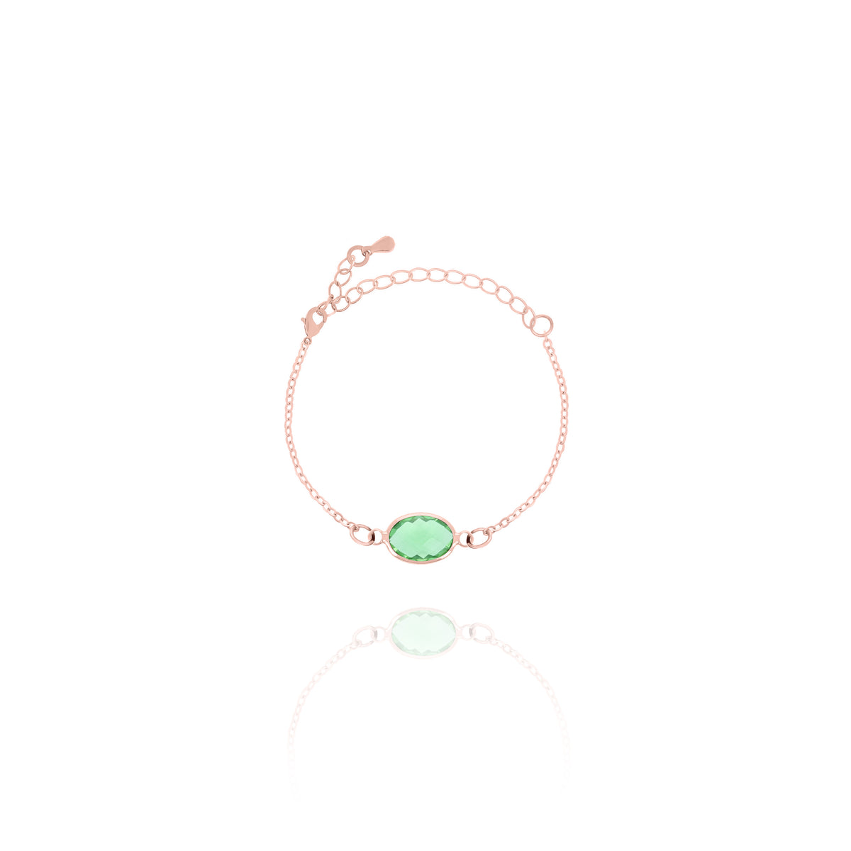 Rose-gold-tone bracelet with light green faceted oval stone and adjustable chain on white background