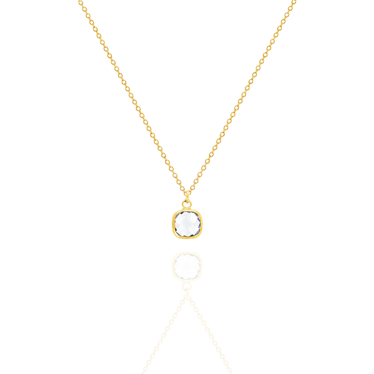 Gold-tone necklace with a clear faceted round pendant on a white background