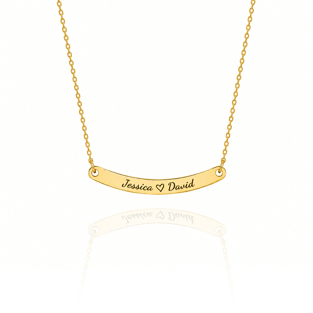 Gold-tone curved bar necklace engraved Jessica, a heart, and David on a white background