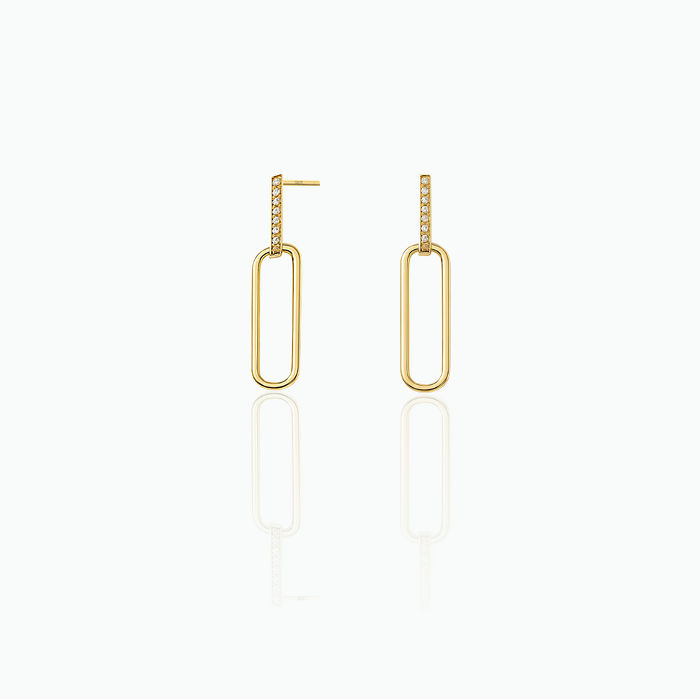 Gold hoop earrings on a white background