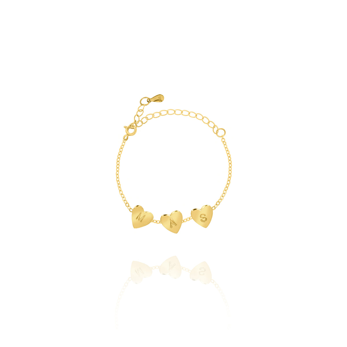 Gold-tone bracelet with three engraved heart charms and adjustable chain on white background