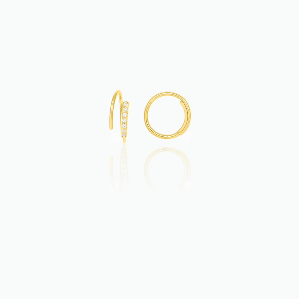 Gold hoop earrings on a white background