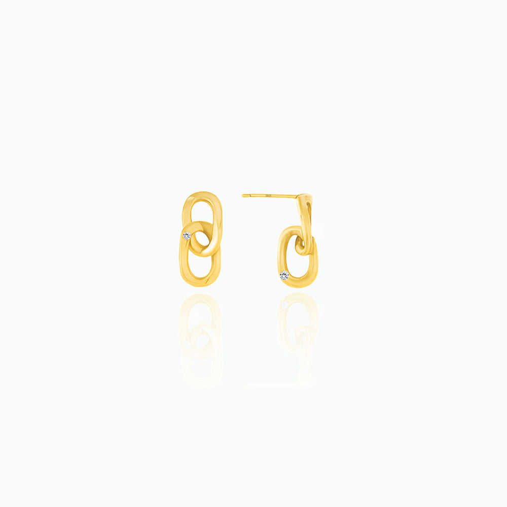 Gold hoop earrings on a white background