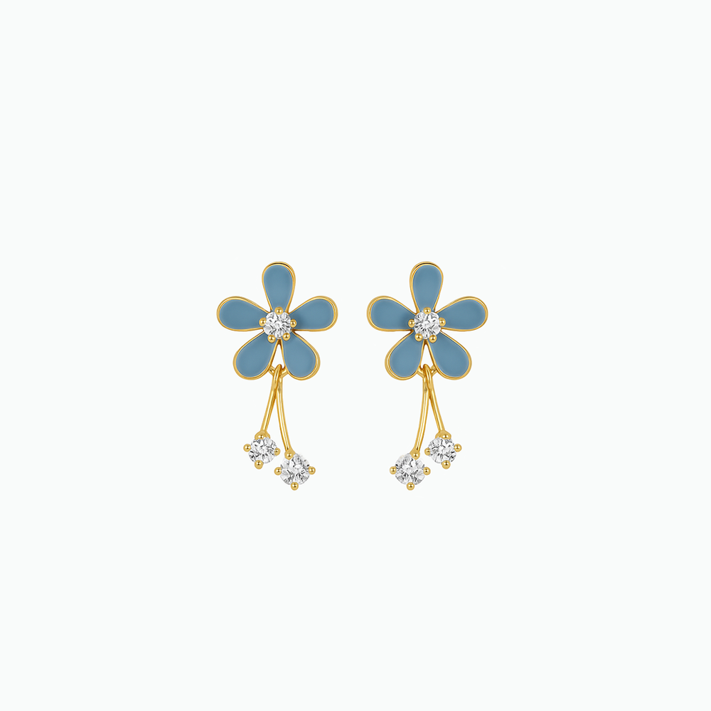 Blue flower-shaped earrings with gold accents on a white background
