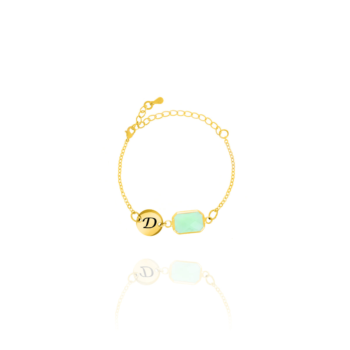 Gold-tone bracelet with engraved D initial disc and light green rectangular stone on white background