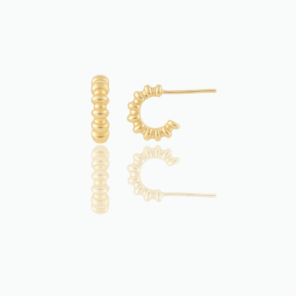 A pair of lightweight beaded hoop earrings with a gold vermeil finish on a white background.
