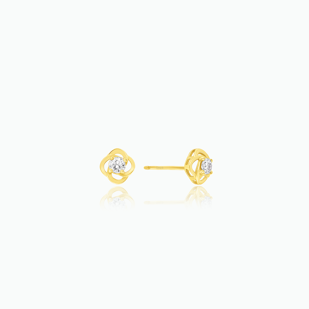 Pair of gold earrings with small diamonds on a white background