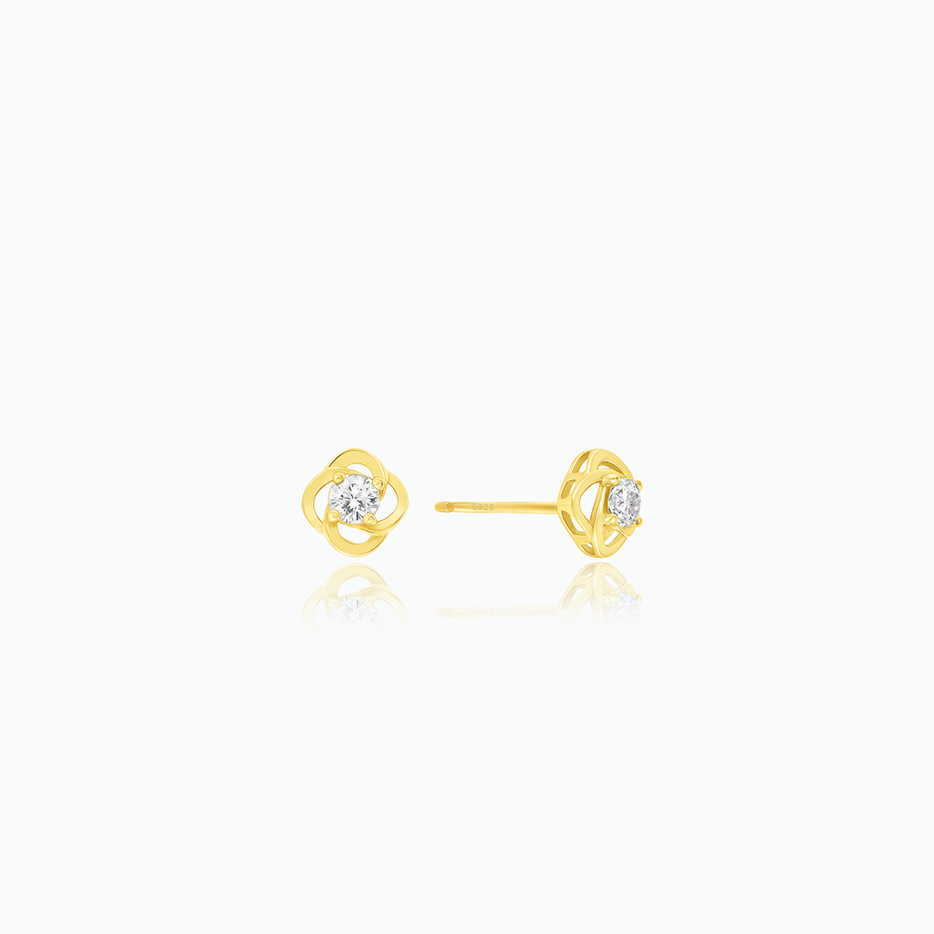 Pair of gold earrings with small diamonds on a white background