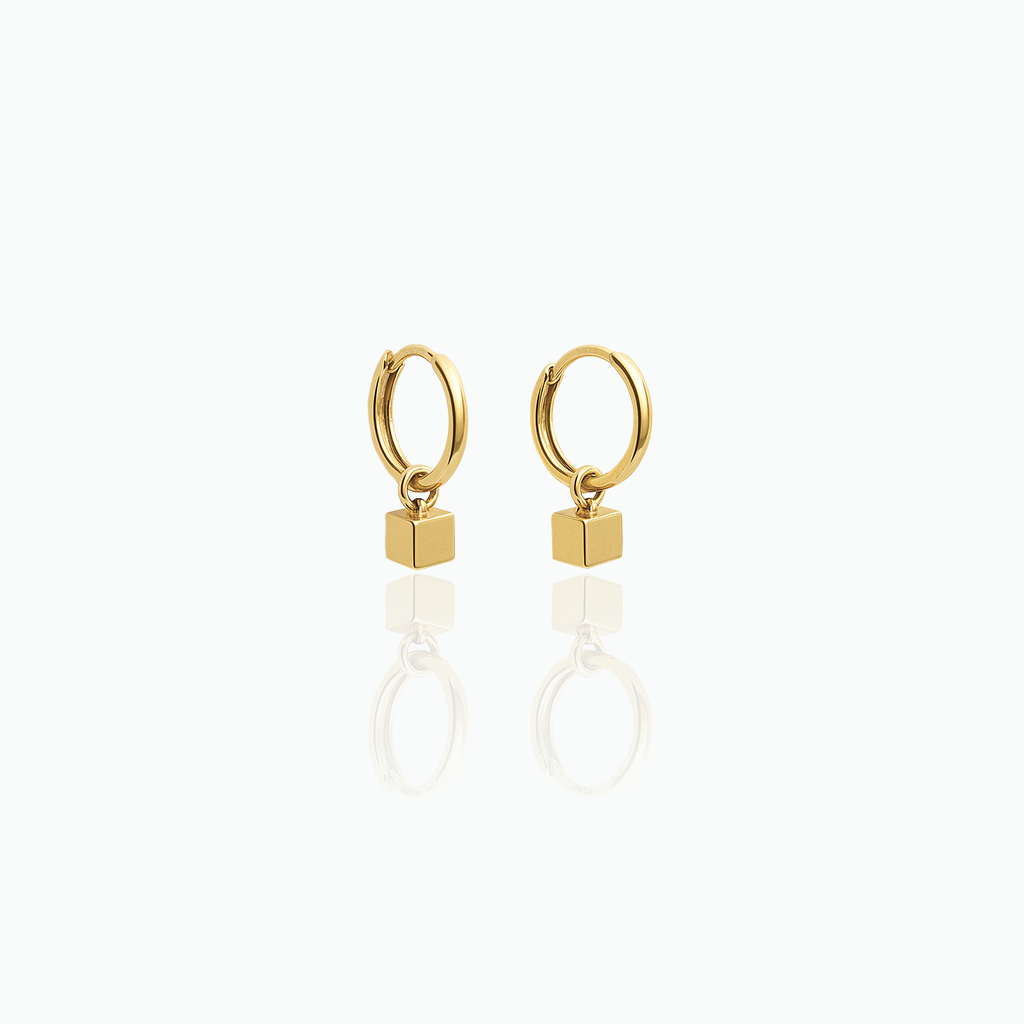 Gold hoop earrings with square tops on a white background