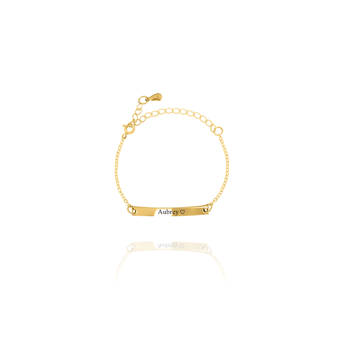 Gold-tone bar bracelet engraved Aubrey with a heart on a white background