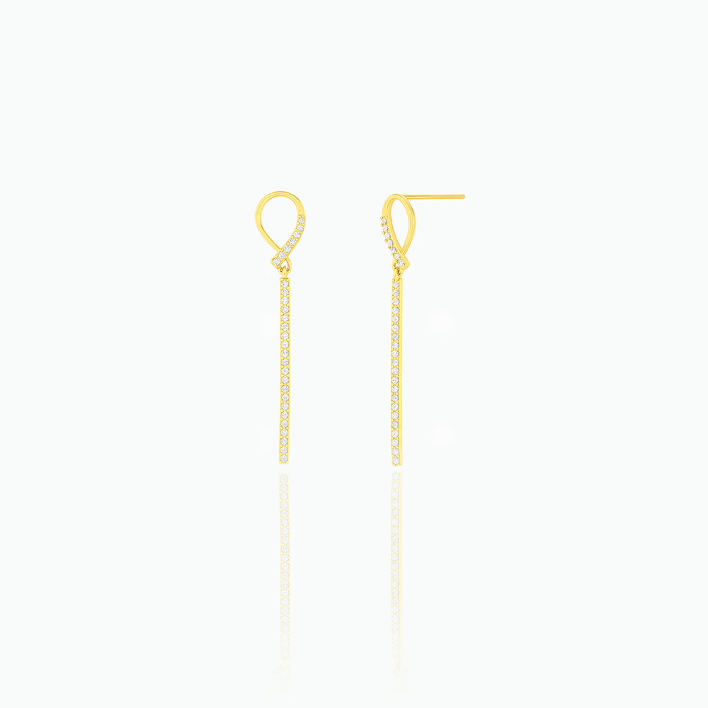 Gold chain drop earrings on a white background