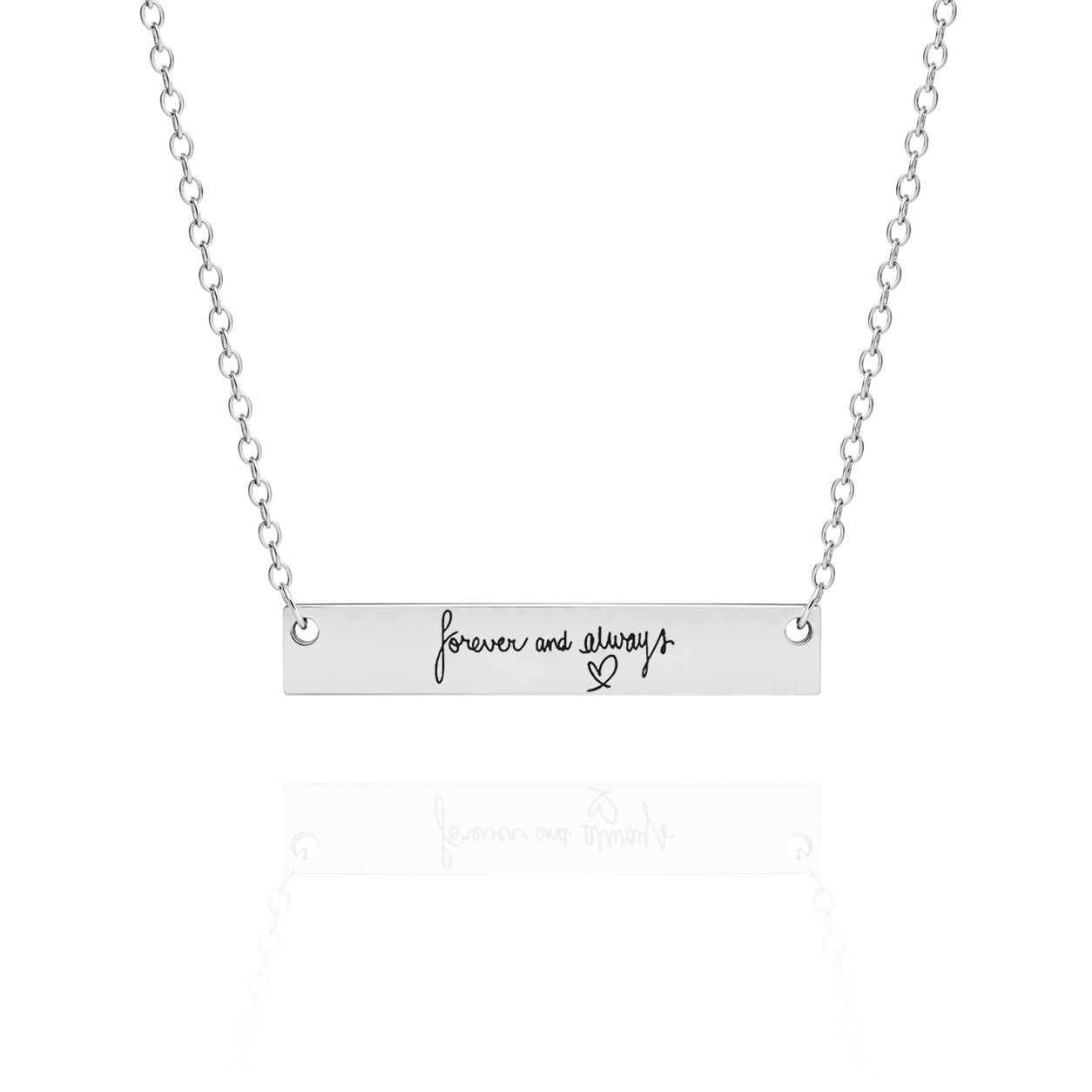 Silver necklace with 'forever and always' bar pendant on a white background