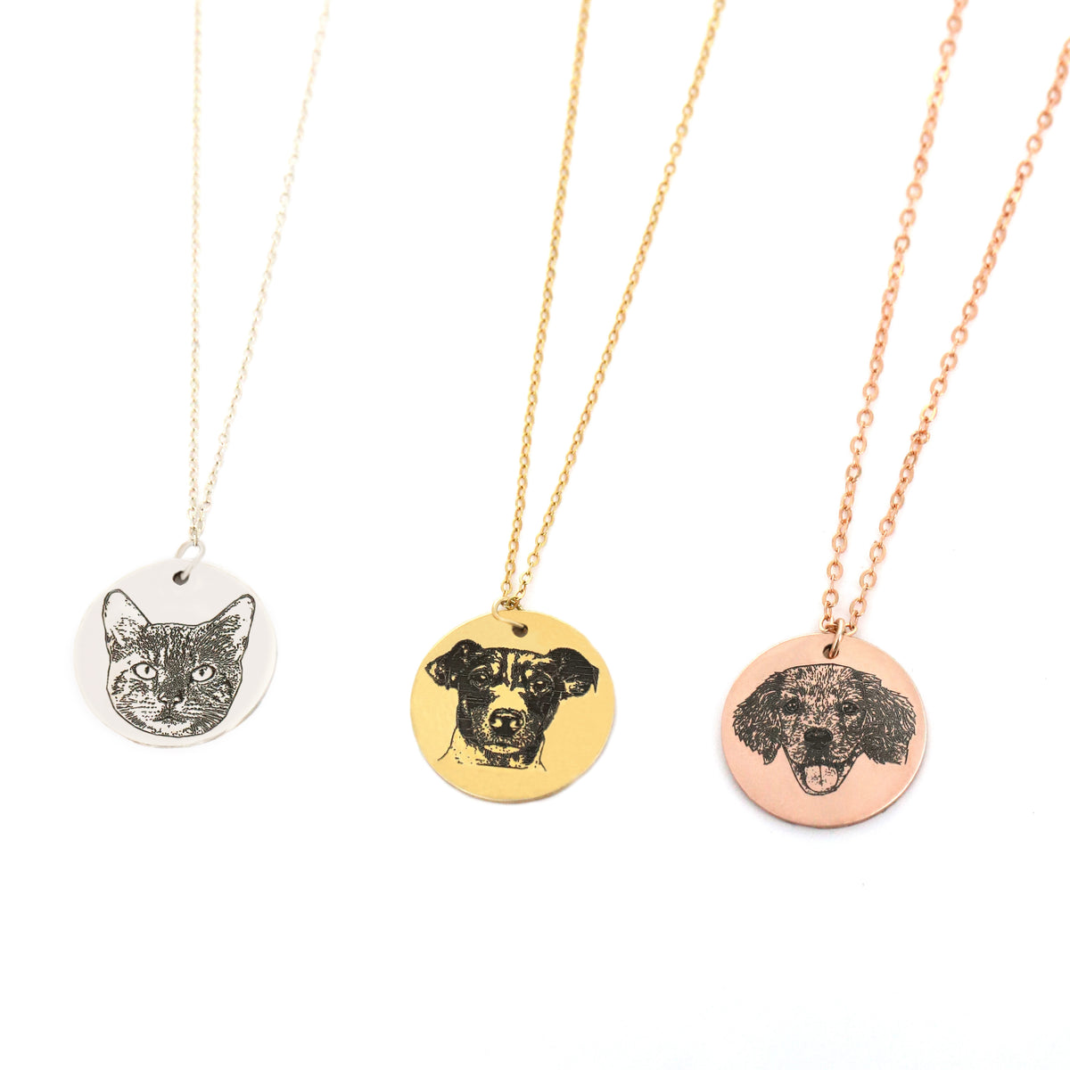Three round pet portrait necklaces in silver, gold, and rose-gold tones on a white background