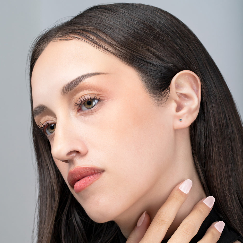 Close-up of a woman's face with a neutral background