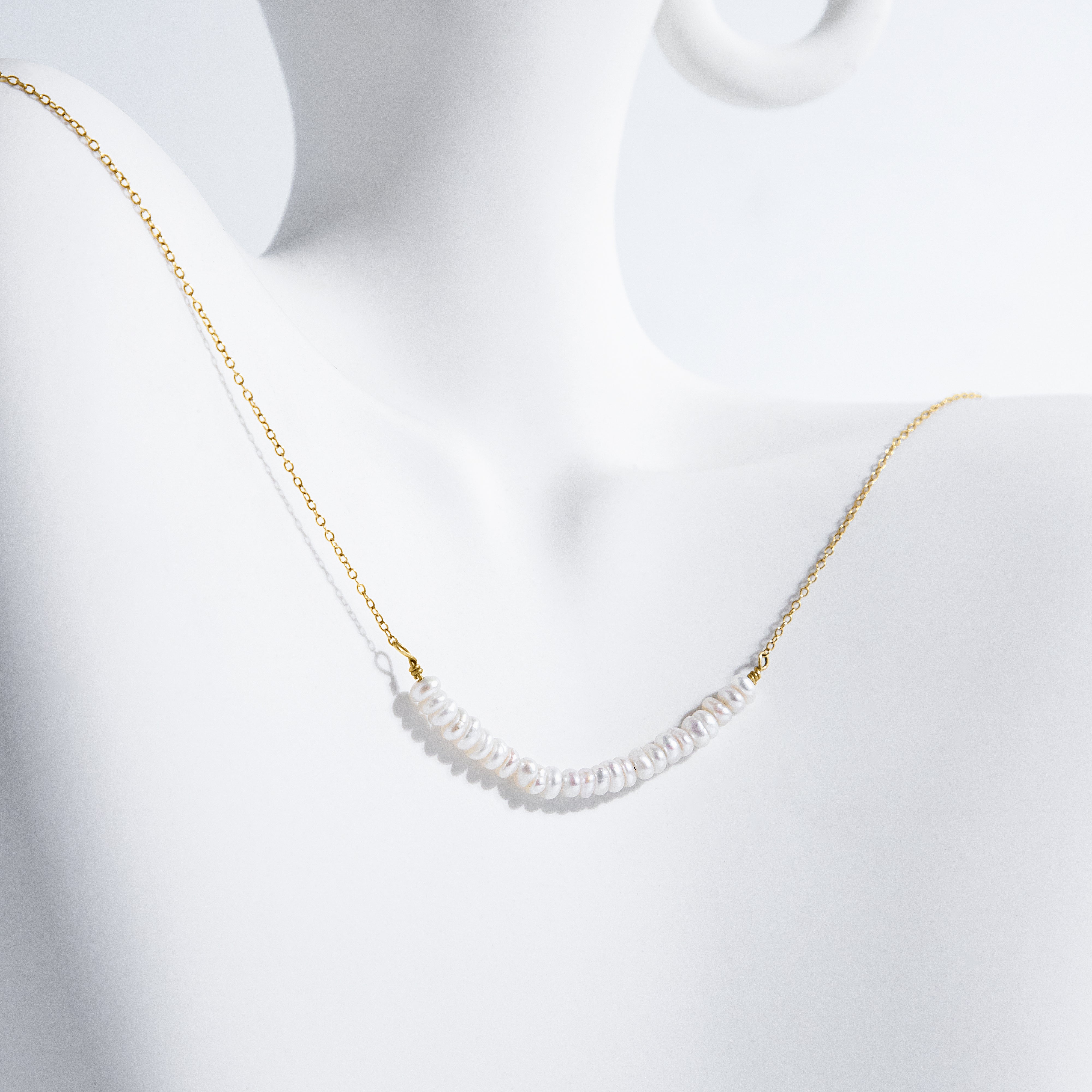 Tiny White Freshwater Pearl Necklace