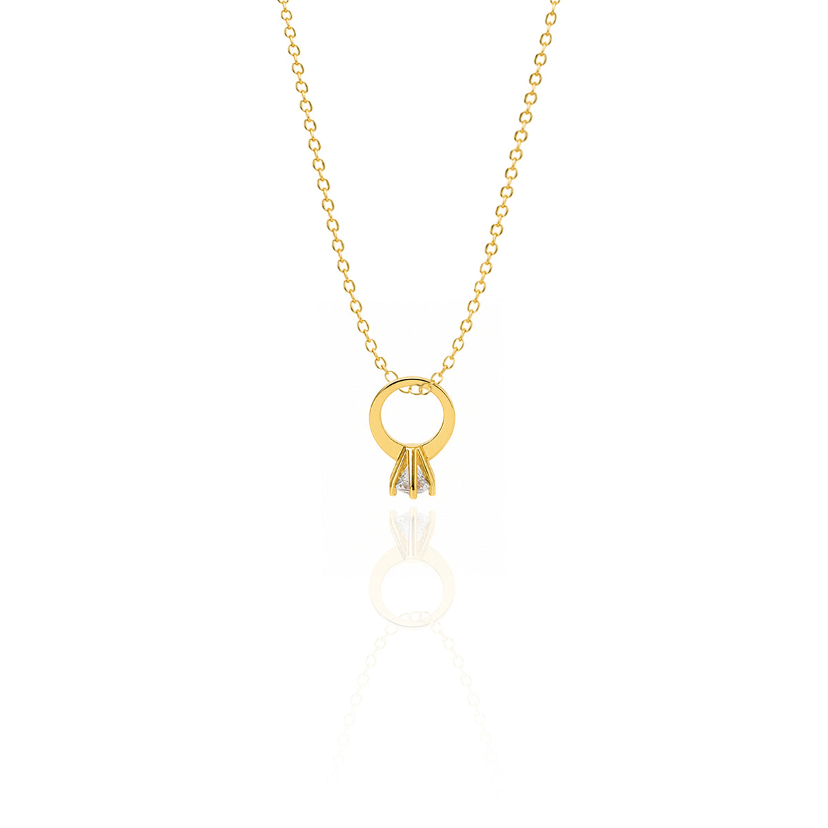 Gold necklace with a circular pendant on a white background