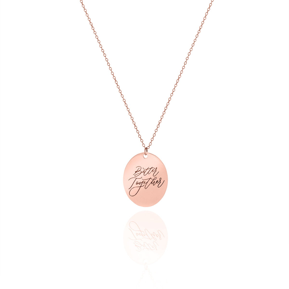 Rose-gold-tone oval necklace engraved with Better Together in script on a white background