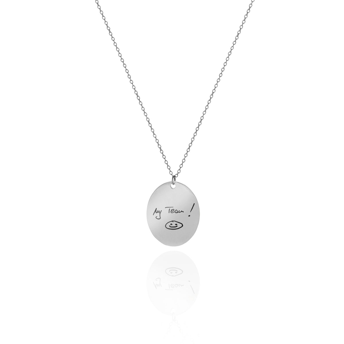Silver-tone oval necklace engraved with My Team! and a smiley face on a white background