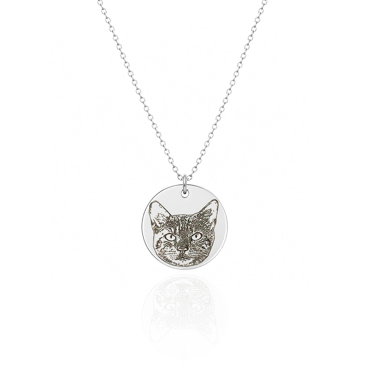 Silver-tone round pendant necklace featuring a cat portrait on a white background