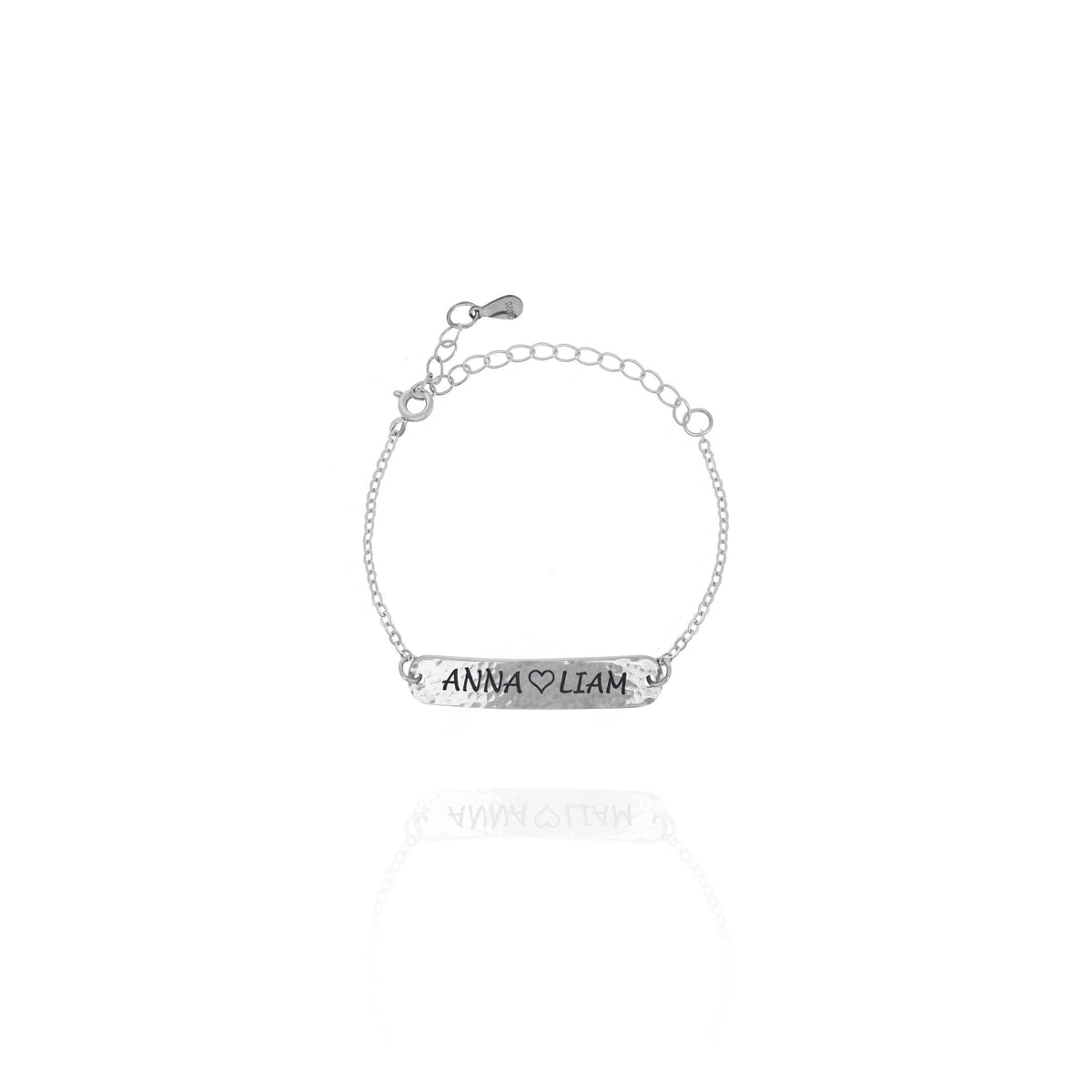 Silver-tone hammered bar bracelet engraved ANNA and LIAM with a heart on a white background