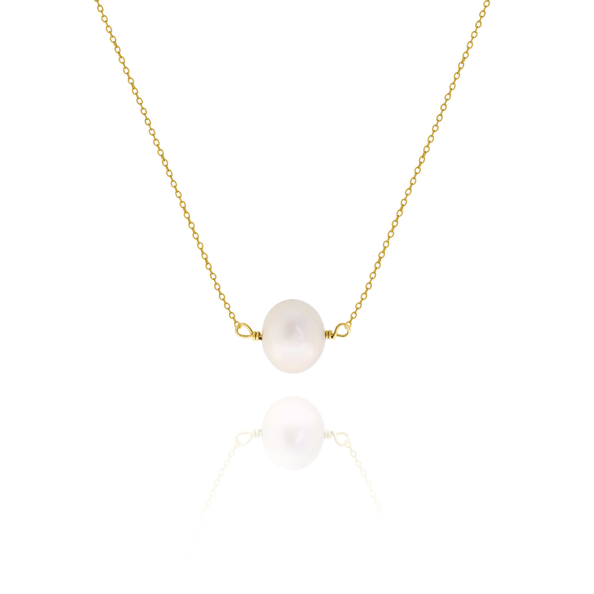 Gold-tone necklace with a single white pearl centered on a delicate chain on a white background