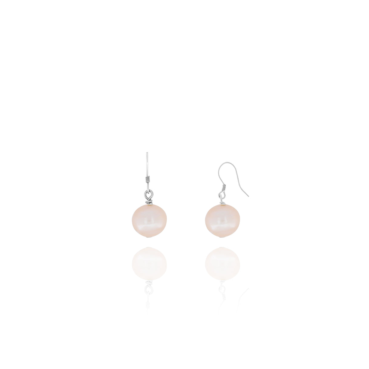 Pair of silver-tone dangle earrings with pale peach rounded drops on a white background