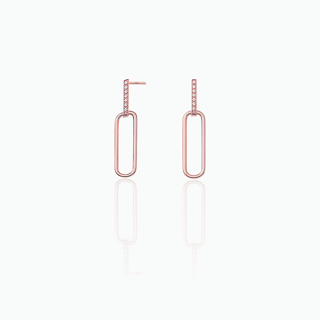 Rose gold hoop earrings on a white background