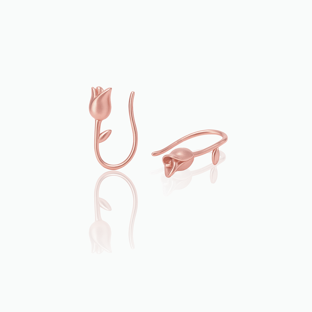 Rose gold tulip-shaped earrings on a white background