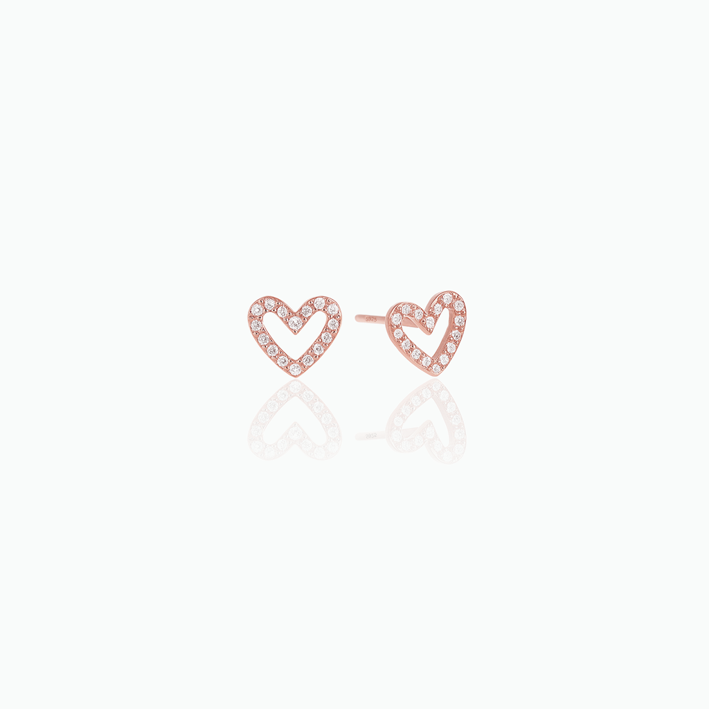 Rose-gold-tone open heart stud earrings with clear stones displayed on a white background
