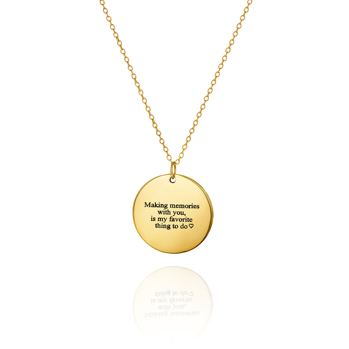 Gold-tone round message disc necklace engraved with Making memories with you is my favorite thing to do and a heart