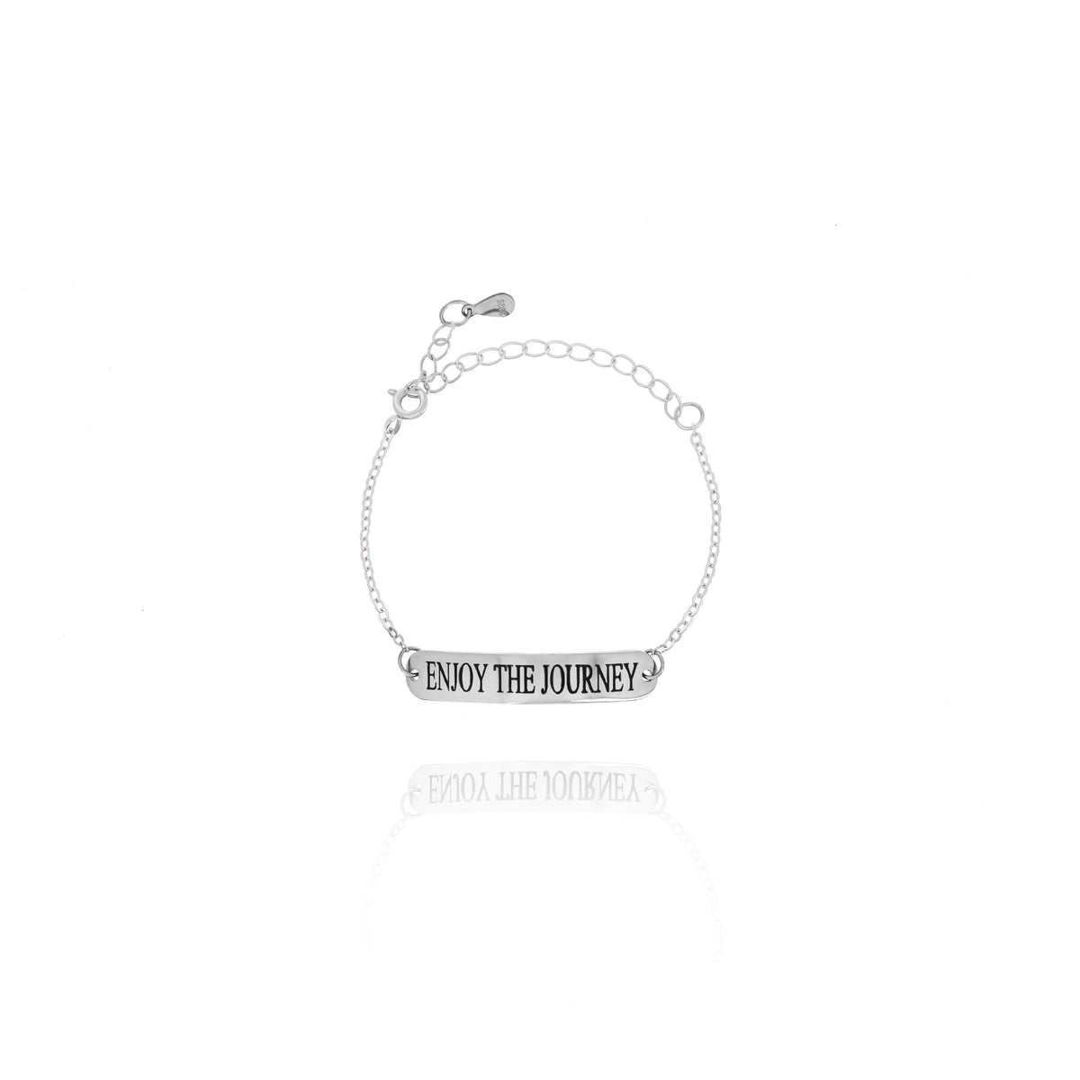 Silver-tone bar bracelet engraved ENJOY THE JOURNEY on a white background