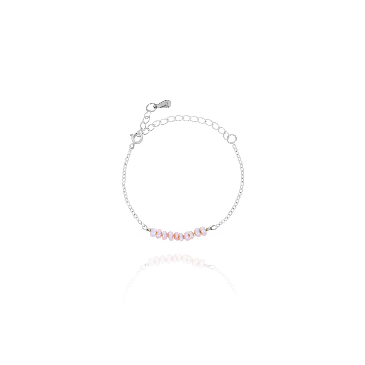 Silver-tone chain bracelet with a row of pale lavender oval beads on a white background
