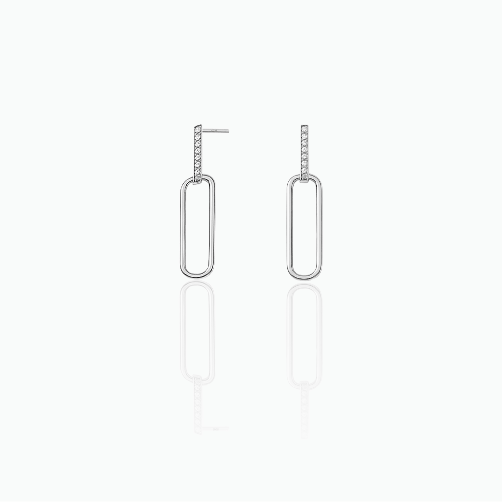 Pair of silver hoop earrings on a white background