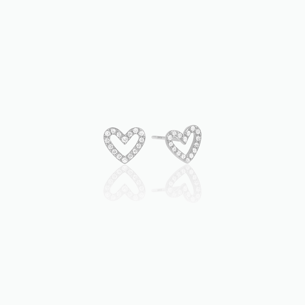 Silver-tone open heart stud earrings with clear stones displayed on a white background