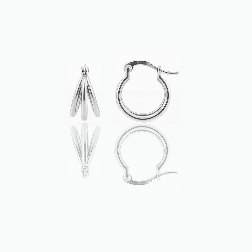 A pair of dainty hoop earrings. The earrings are presented against a white background.