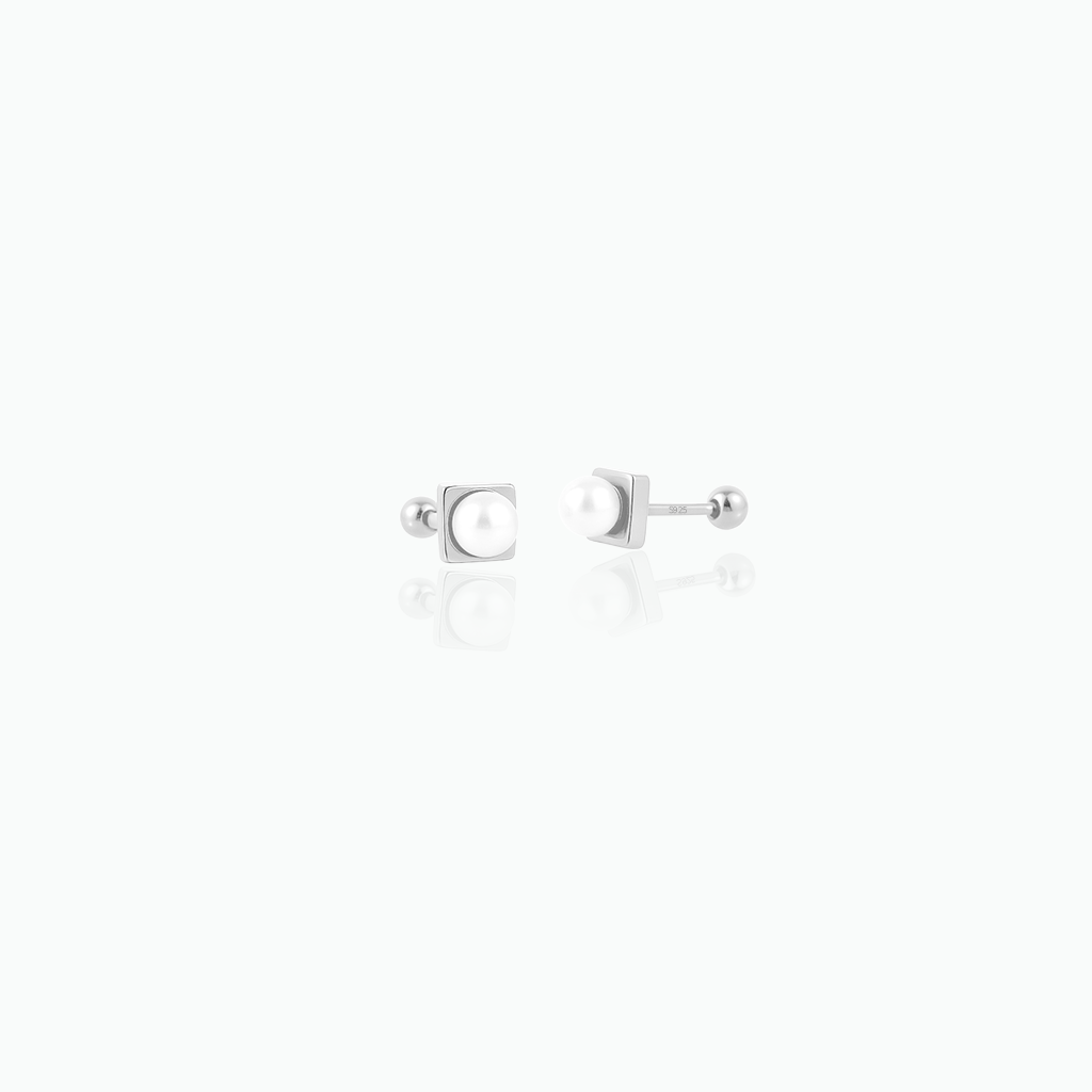 Tiny Freshwater Pearl Stud Earrings in Sterling Silver