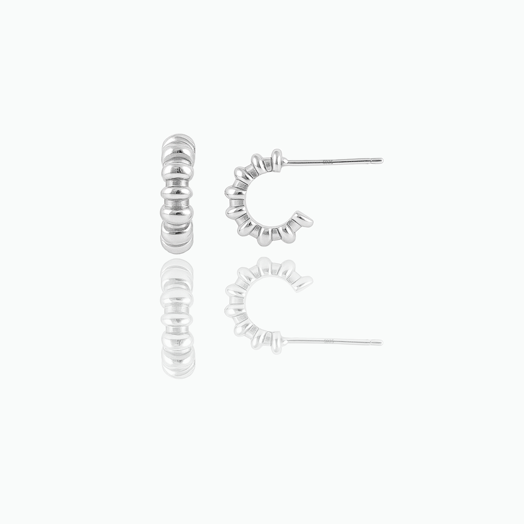 A pair of lightweight beaded hoop earrings with a gold vermeil finish on a white background.