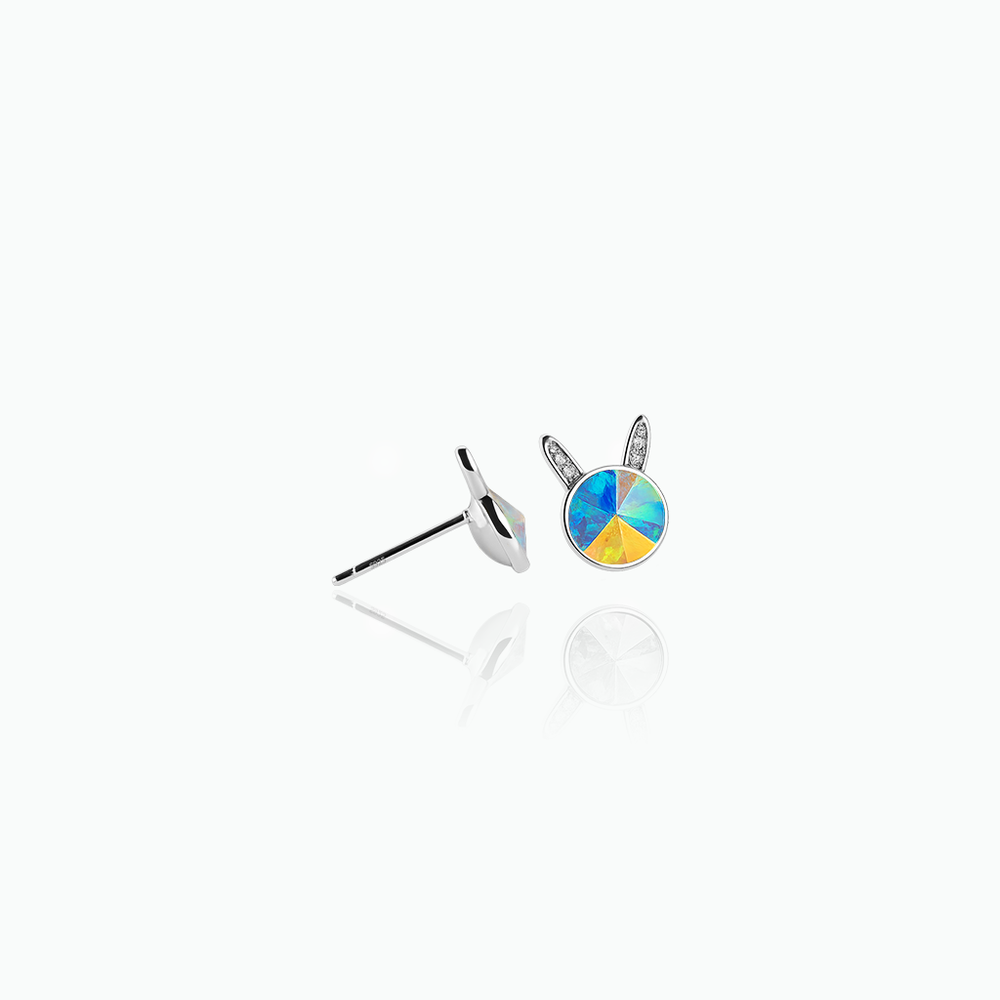 Silver earrings with a colorful gemstone on a white background