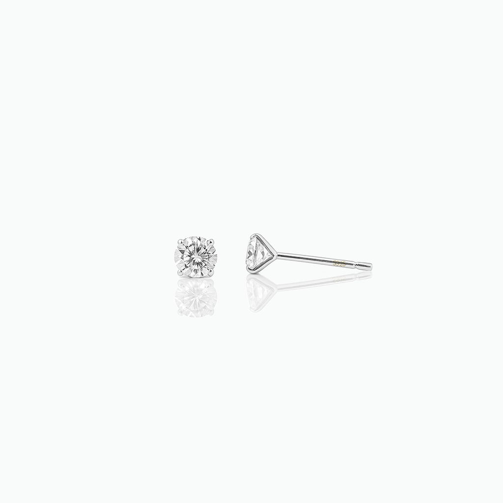 Diamond stud earring on a white background
