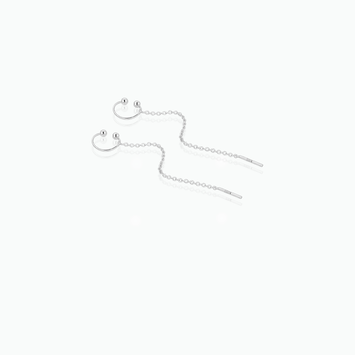 Silver chain earrings on a white background