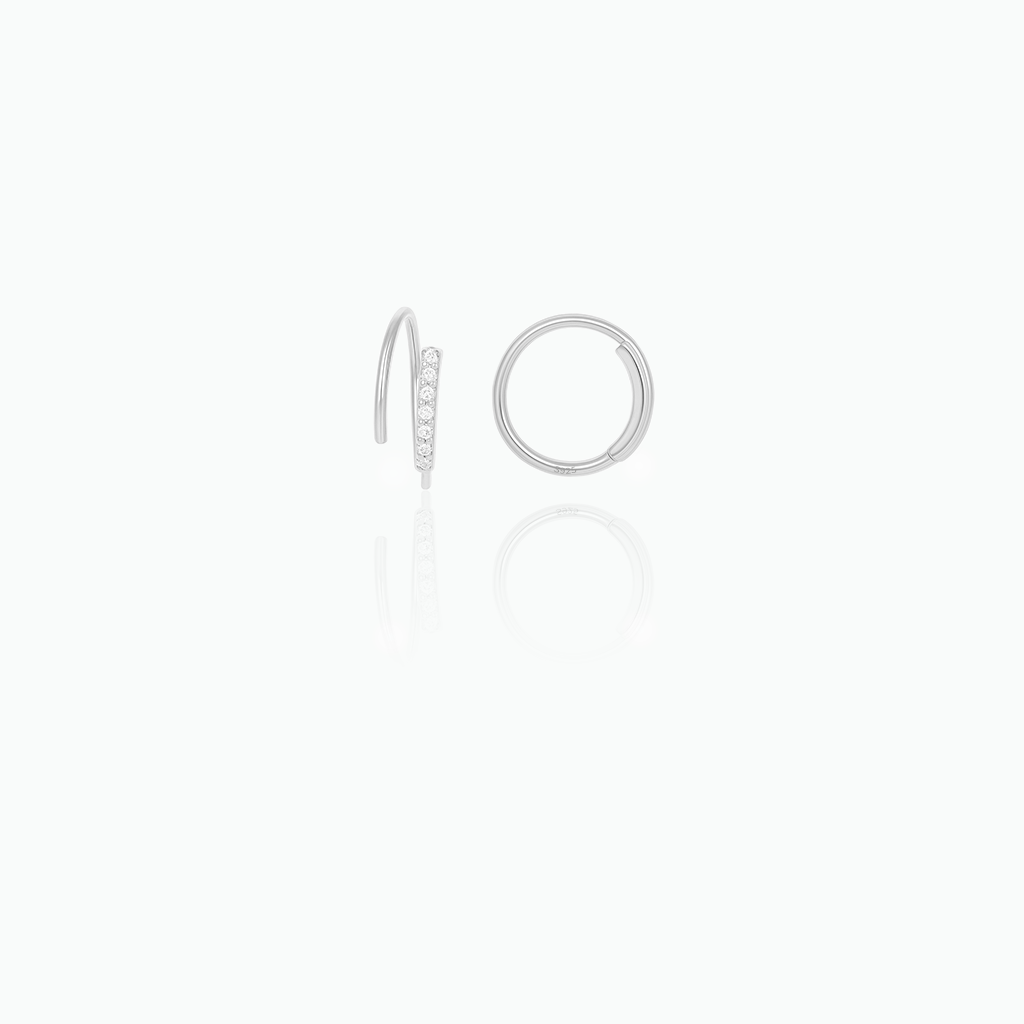 Silver hoop earrings on a white background