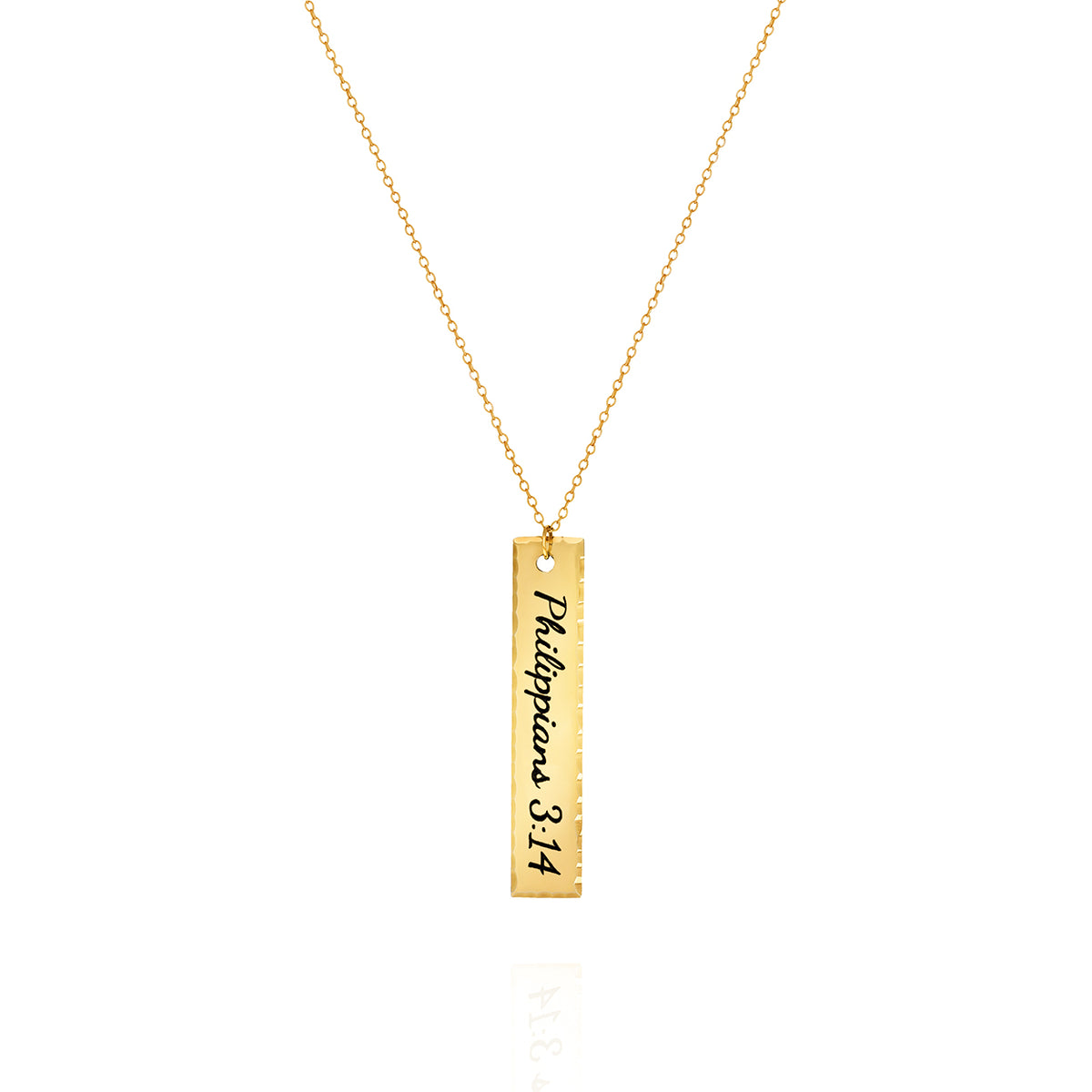 Gold-tone vertical bar necklace engraved with Philippians 3:14 on a white background