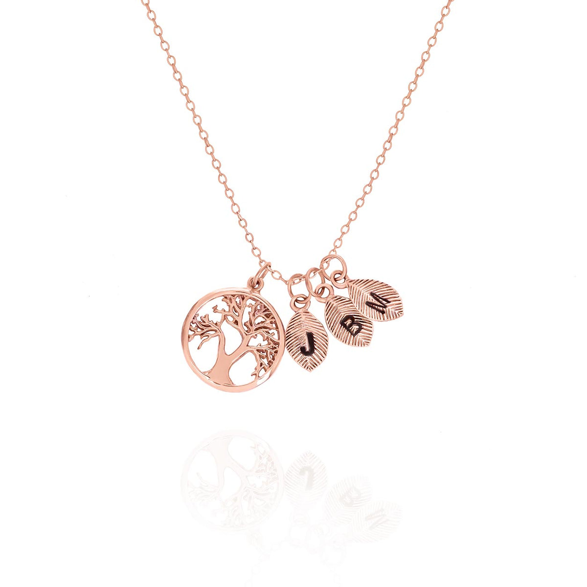 Rose-gold-tone tree of life necklace with three leaf-shaped initial charms on a white background