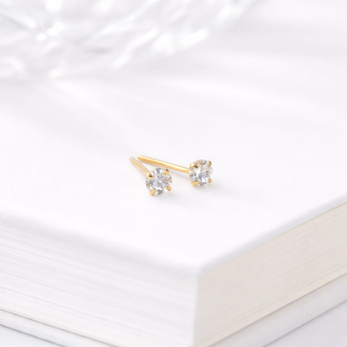 Tiny CZ Stud Earrings in Sterling Silver