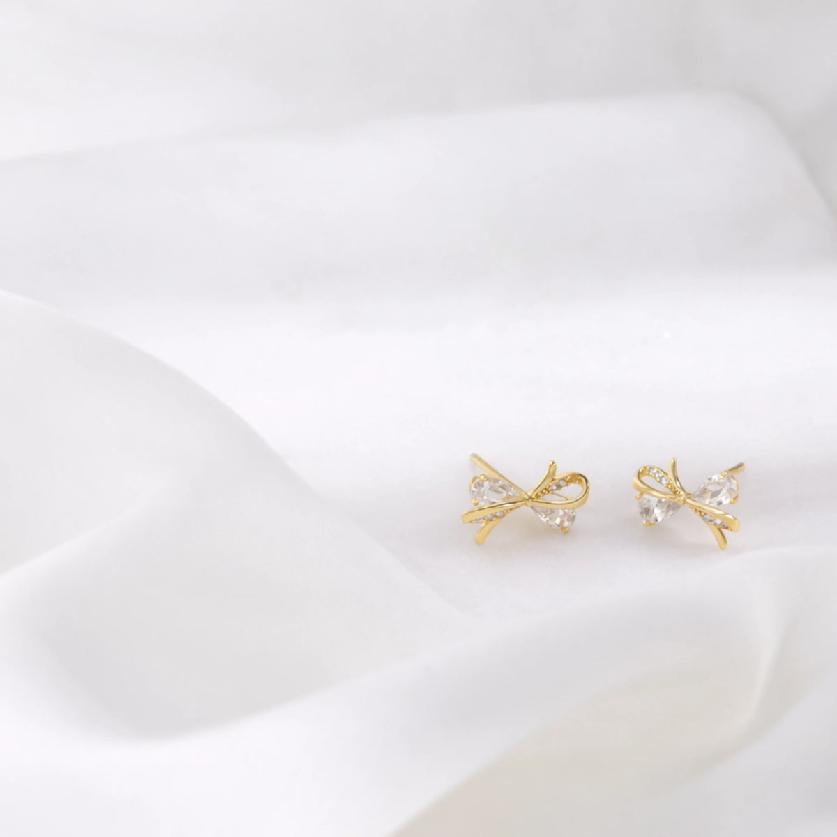 Sterling Silver CZ Bow Stud Earrings