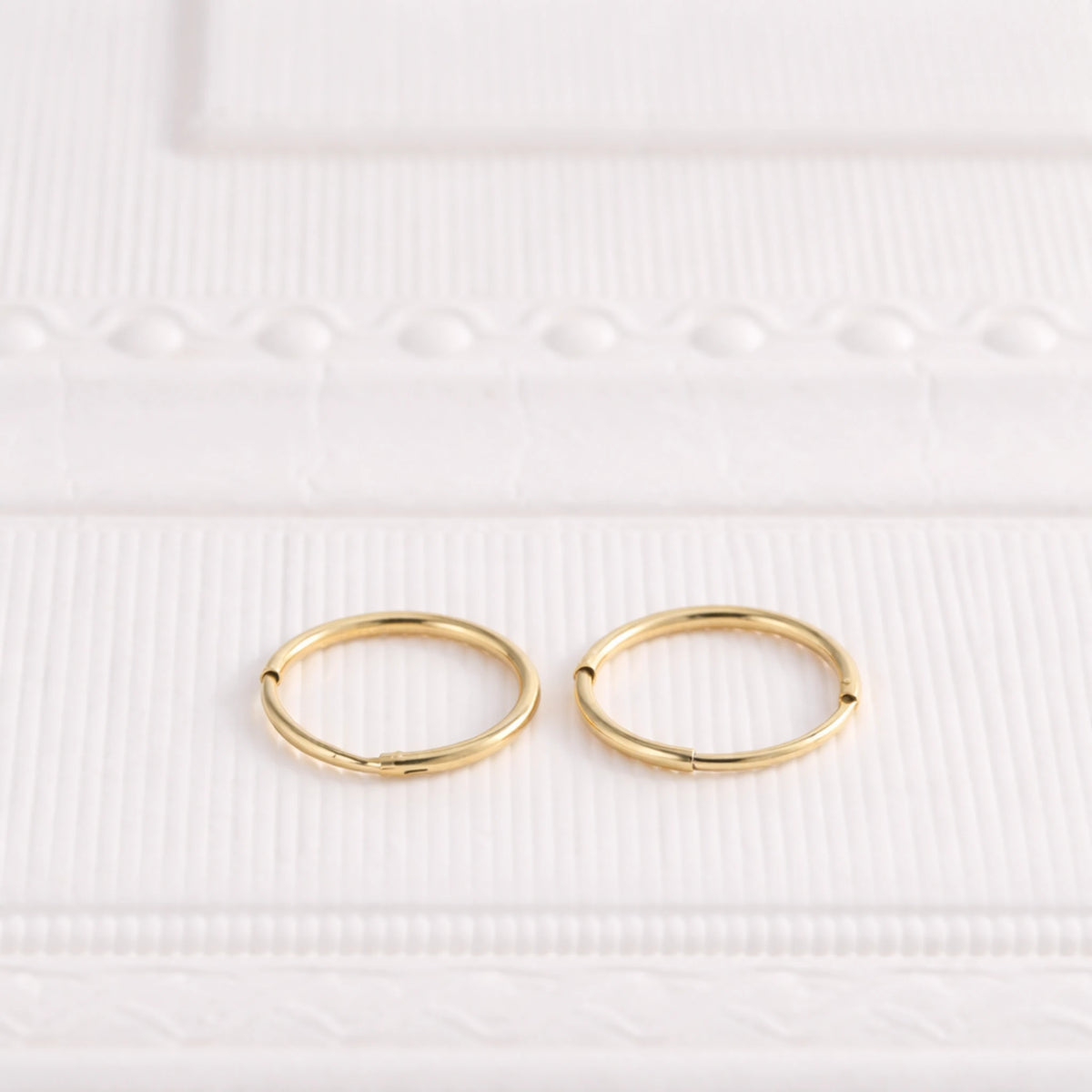 Sterling Silver Tiny Huggie Hoop Earrings